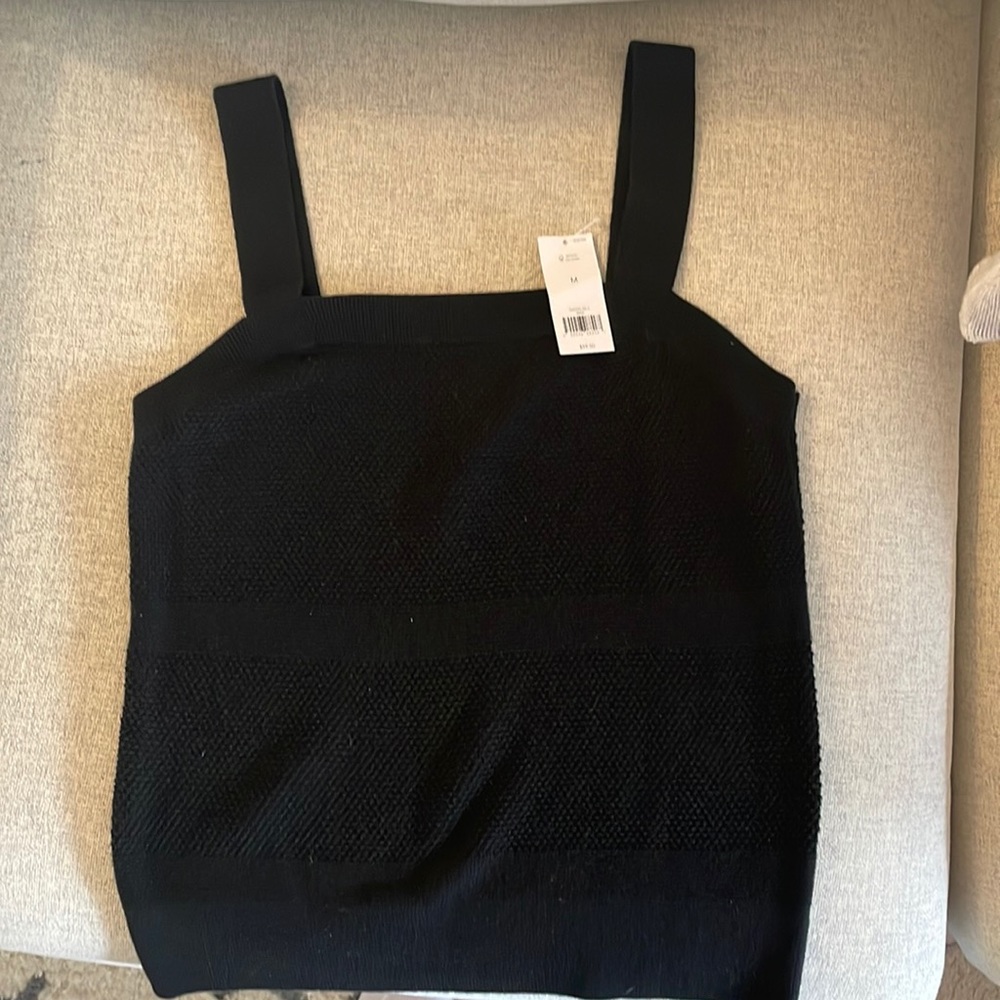 Black Banana Republic sweater tank- NEVER WORN with tags on. Size medium.